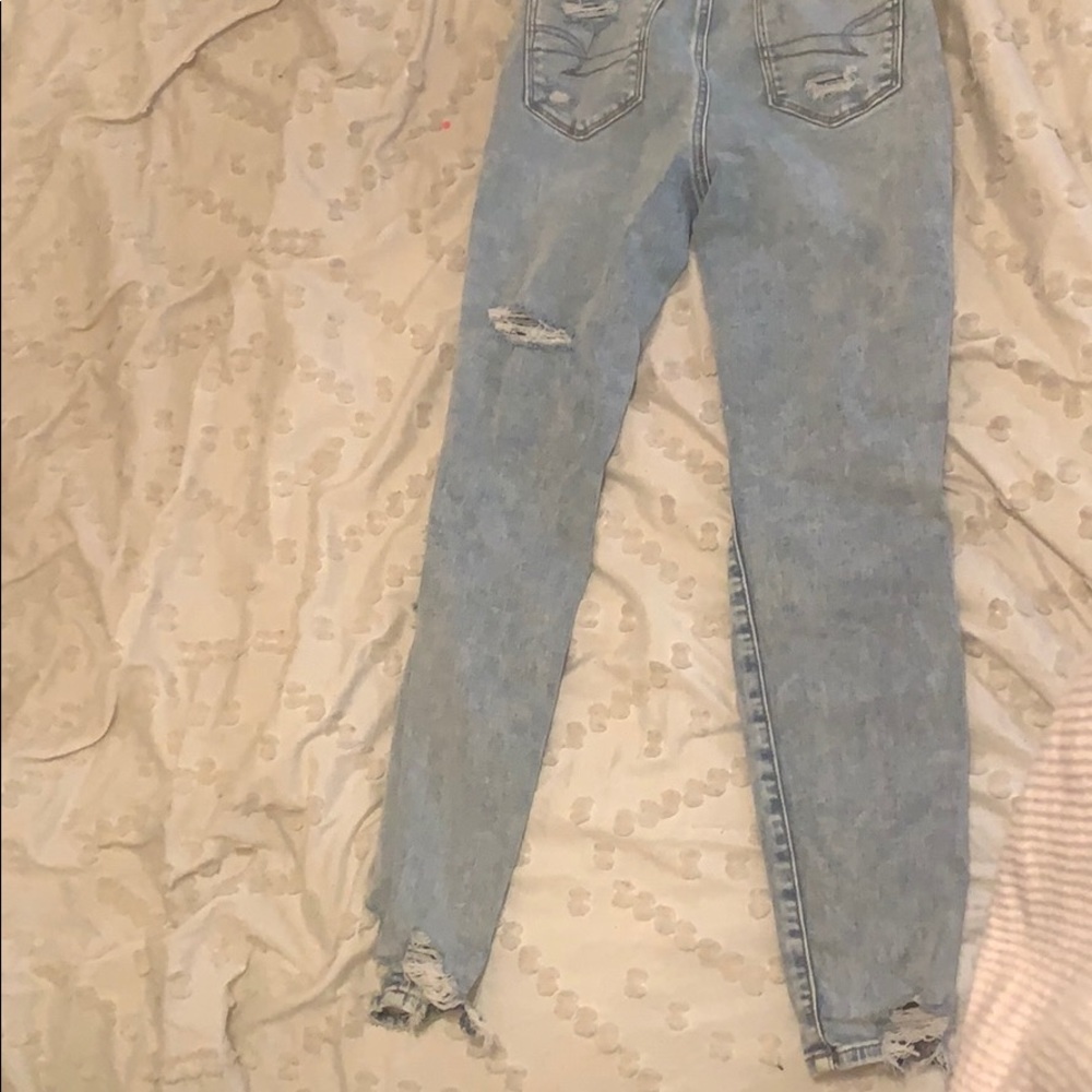 high rise ripped jeans. - Picture 2 of 3